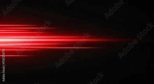 Vivid red light streaks on a dark background create a sense of speed