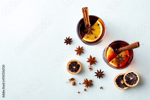 Cozy winter drinks with spices and citrus