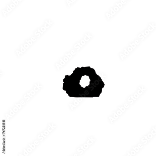 Silhouette of a Small Rock with a Hole.