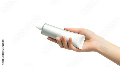 Hand holding a white squeeze tube against a white background