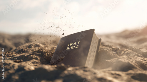 Ancient Testimony: A weathered book lies partially buried in the sand, its gold-lettered title of Holy Bible whispers tales of faith and heritage