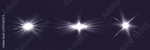 Set of glowing light flares with bright starburst and lens flare effects on dark transparent background.
