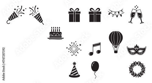 Black and white celebration with party poppers and birthday cake