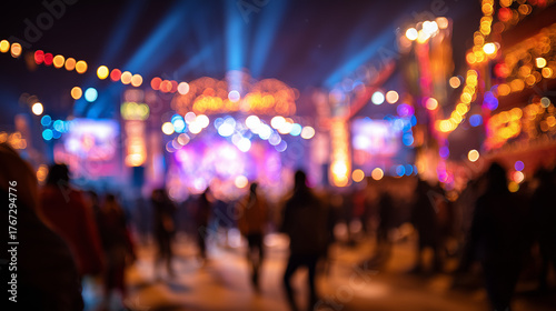 Night crowd enjoying live music and glowing festival lights during Poush Mela celebration in Santiniketan