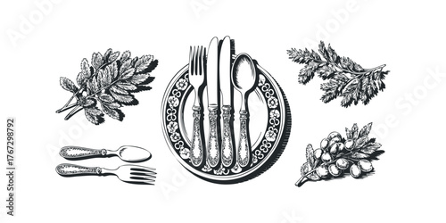 Vintage cutlery with decorative plate and foliage