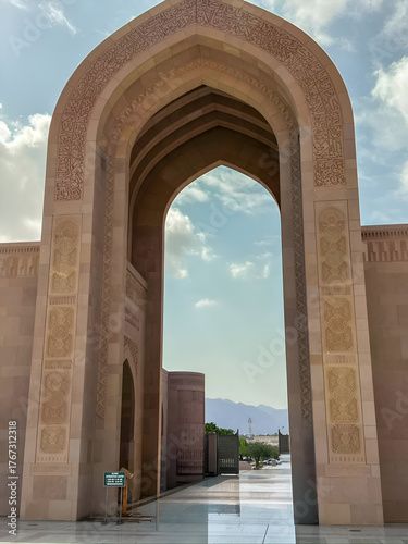 Traditional arched gateway in Muscat, Oman.Iconic architectural gateway featuring Arabic design and details in Muscat, Oman.

