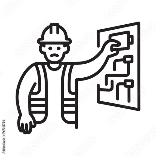 Electrician in hard hat working on electrical panel diagram