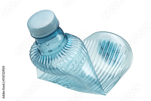 A crushed plastic water bottle on a white