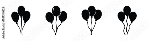 Four clusters of black balloons celebrate joyful occasions and festive parties