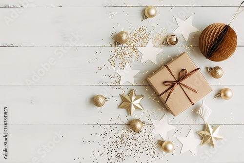 Christmas gift box with golden ornaments and white stars