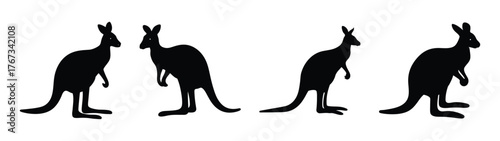 Four black kangaroo silhouettes in a row jumping and standing art