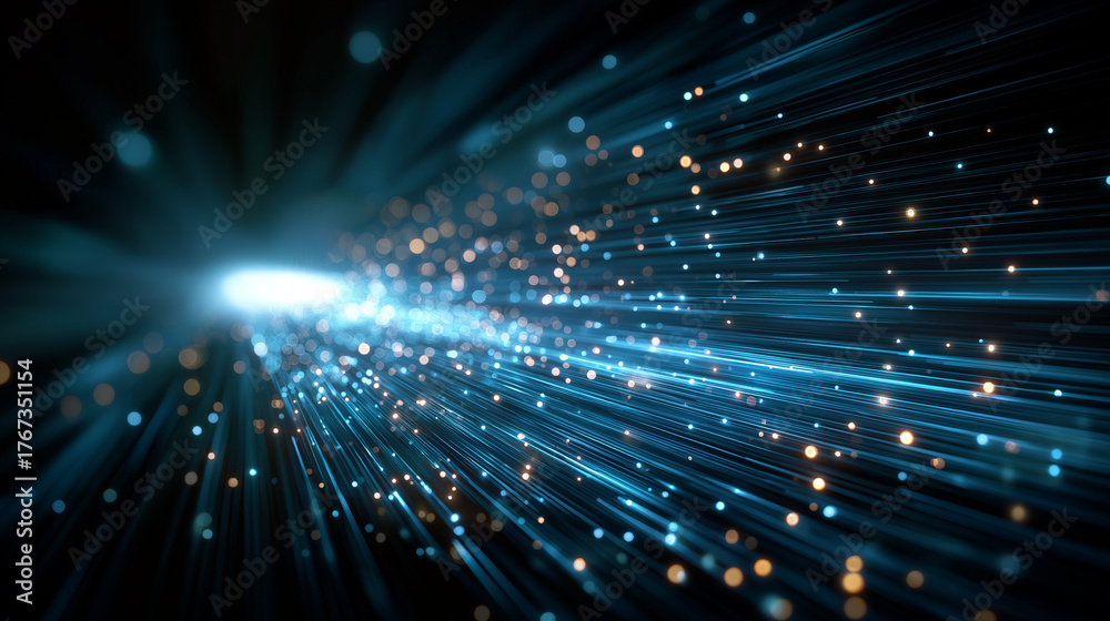 Fototapeta premium Digital Data Flow: An abstract display of shimmering, blue and gold lights exploding from a central source, visualizing the rapid flow of digital information and technological progress.