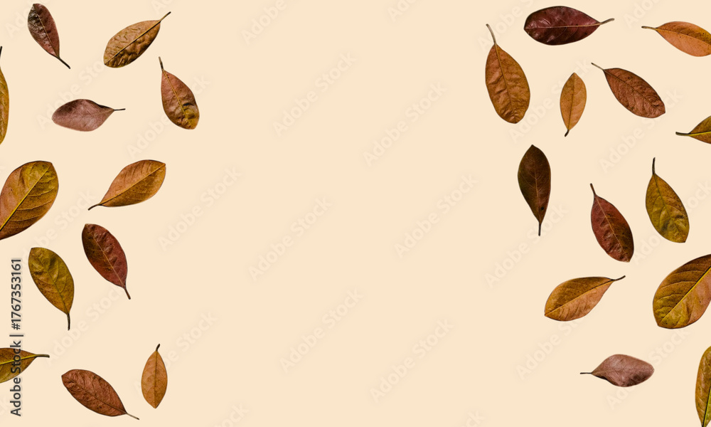 Obraz premium Falling jackfruit autumn leaves on a light orange surface