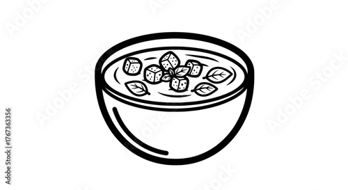 Bowl of soup with basil and diced ingredients delicious and healthy.