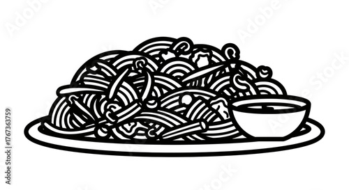 Delicious plate of spaghetti with a side of dipping sauce ready to eat.