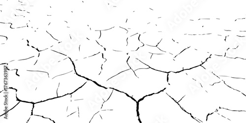 Cracked dry earth texture symbolizing drought and desertification. High-contrast black and white cracked soil background perfect for climate change, environmental awareness, and texture design project