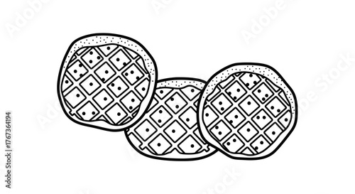 Three round waffles with square patterns and dots on the edges.
