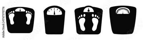 Four black personal bathroom scales displaying footprints and weight measurement dials