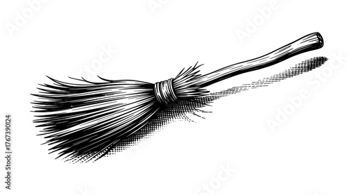 a classic broom shown diagonally with its handle extending to the right, symbolizing cleanliness and tradition.