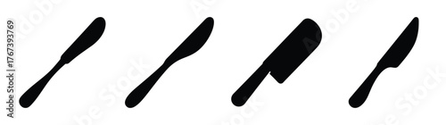 Four distinct black butter knives displayed in a row cutlery collection kitchen utensils