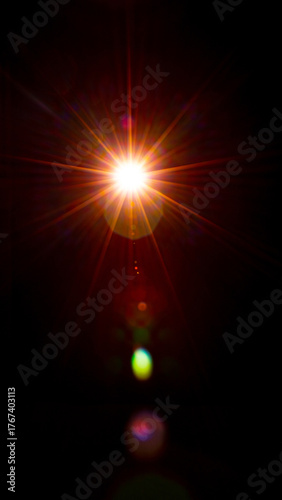 Sun flare on the black background