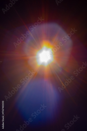 Sun flare on the black background
