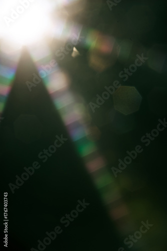 Abstract sun flare. The lens flare is subject to digital correction