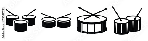 Drumlineensemblepercussioninstrumentswithdrumsticksreadyforrhythmicperformance