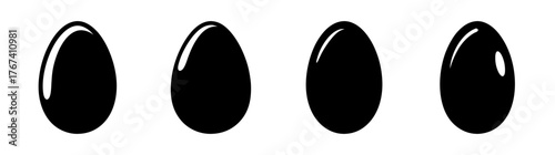 Fourglossyblackeggsarrangedinahorizontallineshowingsubtlehighlightsandreflectionsonacleansurface