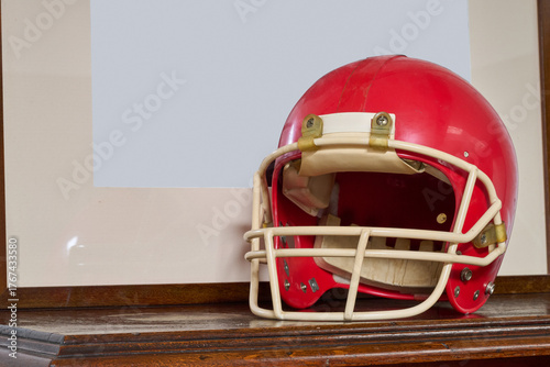 Wallpaper Mural Red american football helmet on furniture Torontodigital.ca