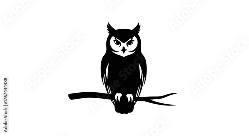 Silhouette of a fierce looking owl perched on a tree branch against a white background