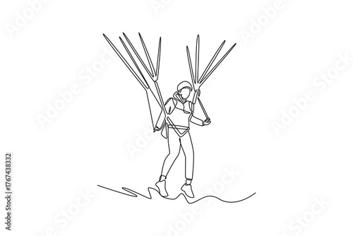 Single continuous line drawing sporty woman is paragliding, preparing for takeoff or landing on slope, supported by lines from an unseen chute. Dynamic one line draw graphic design vector illustration