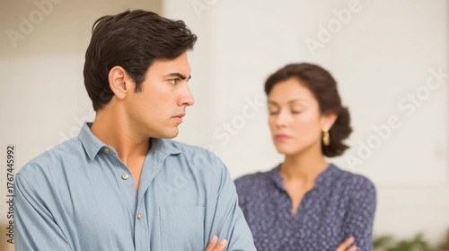 Grudge. Offence. Conflict between husband and wife. Tense, upset spouses. Mistrust. Argument. Disdainful look of a jealous husband