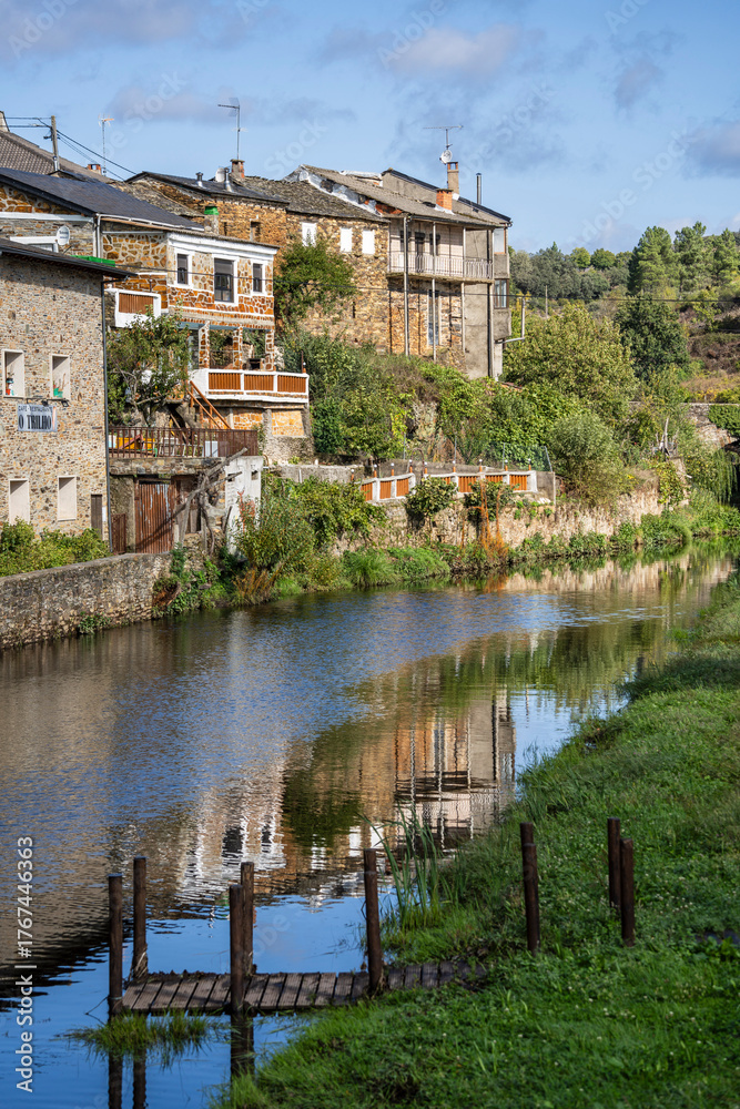 Obraz premium Typical houses along the Onor River, Rio de Onor town, municipality of Braganza, Trás-os-Montes and Alto Douro, Portugal