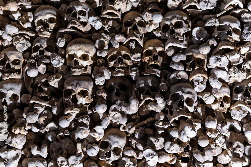 Fototapeta premium Ossuary with skeletons from the 13th to the 18th century, Pre-Romanesque temple of Santa María de Wamba, 10th century, Montes Torozos region, Valladolid, Castile and Leon, Spain