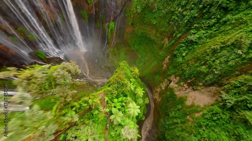 Top-down FPV drone view of Tumpak Sewu waterfall, Inonesia.