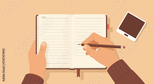 Handwriting in open journal with blank pages and polaroid camera on desk