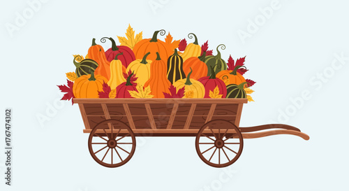 Autumn harvest cart with colorful pumpkins and leaves