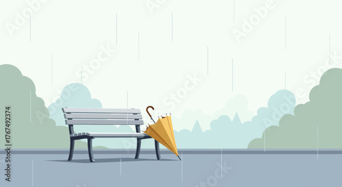 A solitary park bench with a yellow umbrella in the rain.