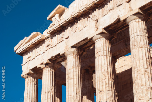 Parthenon without scaffolding. Details of Acropolis with Greek columns and marble ruins. Ancient architecture from the classical era.