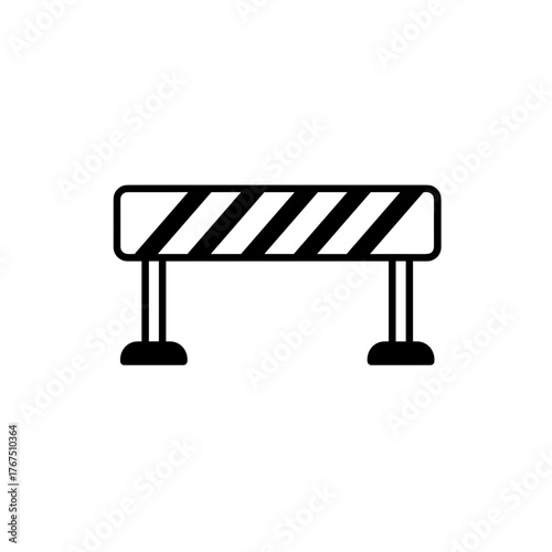Black and white striped barrier with rounded edges and short legs
