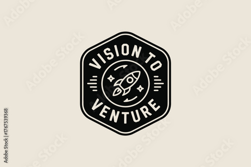 A black and white logo badge with a rocket ship and the words vision to venture in a hexagon shape