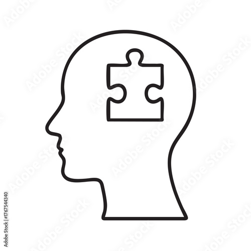 Human head outline with a puzzle piece inside representing thought