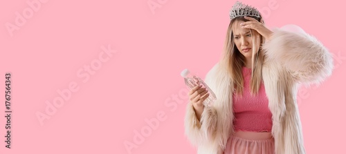 Young woman with hangover a...