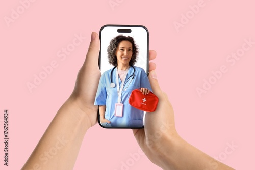 Patient holding smartphone ...