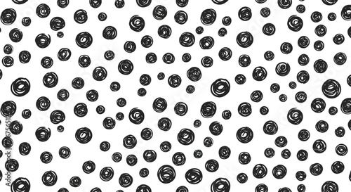 abstract doodle pattern a scattered collection of hand-drawn black circles on white for creative backgrounds textile prints and playful designs.