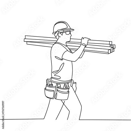 Construction worker carrying lumber on his shoulder with tools