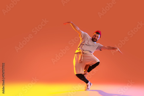 Handsome young man dancing ...