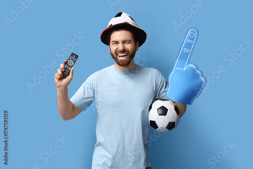 Young man with foam hand an...