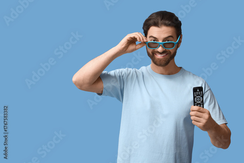 Young man in 3D glasses wit...